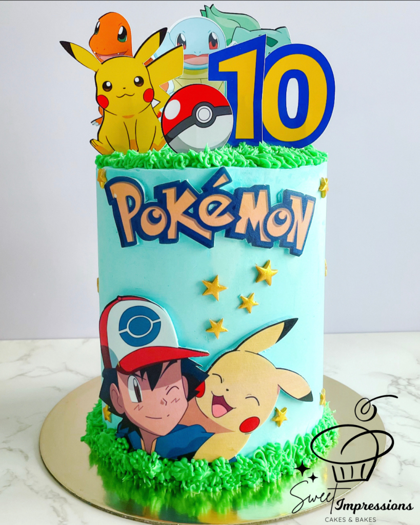 Pokemon cake with edible images and custom cake toppers