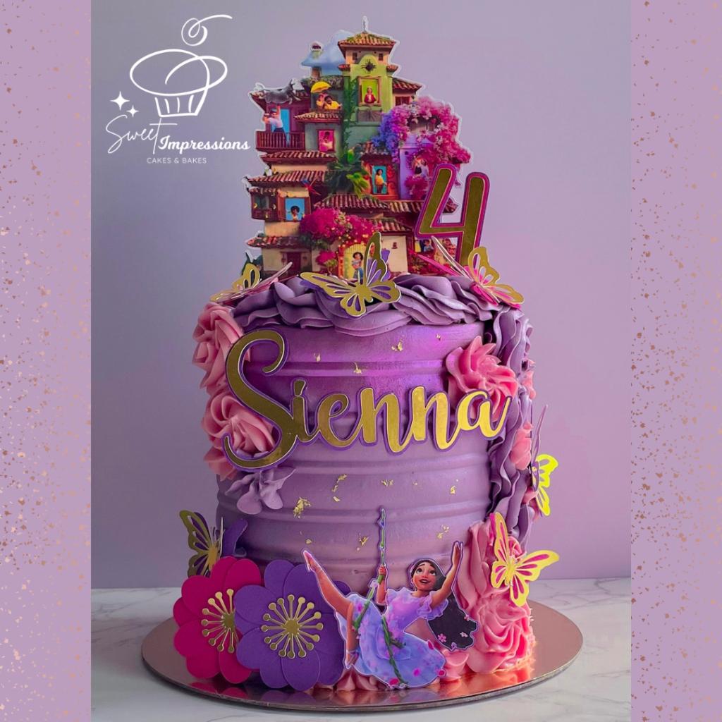 Purple custom designed Encanto cake with butterflies